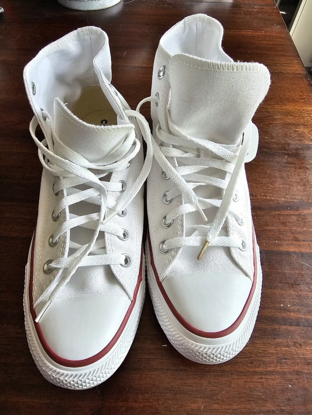 Converse White High-Top Canvas Chuck Taylor Sneakers with Red Trim